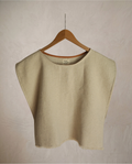 Top beige con flecos
