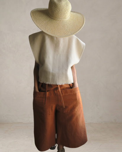 Top beige con flecos