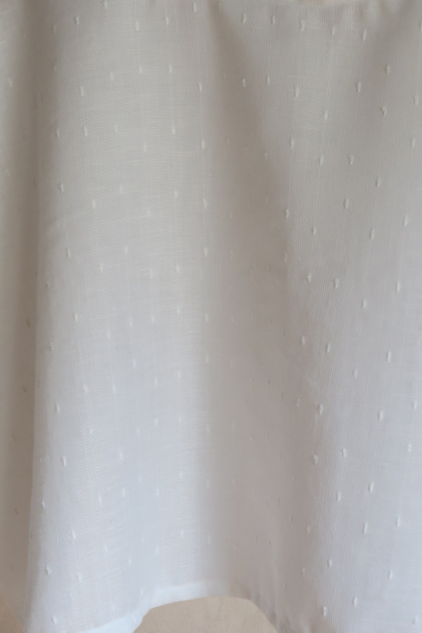 Camiseta blanca semitransparente