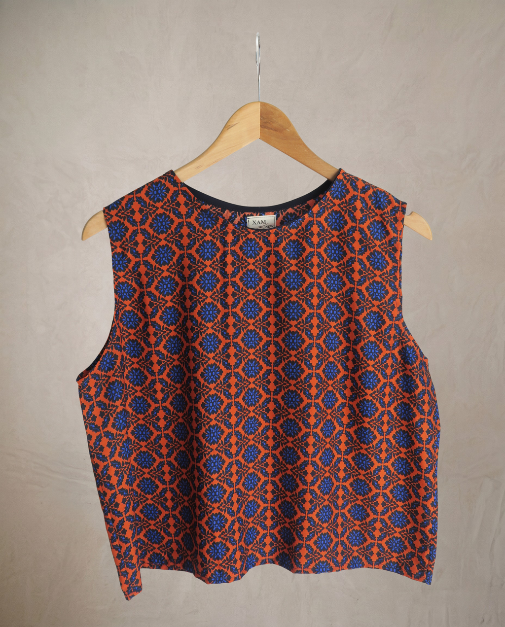 Top tirantes geometria naranja/azul